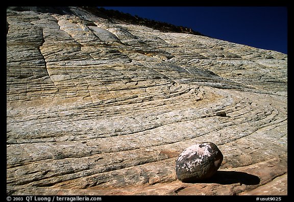Boulder and striated Sandstone, Burr Trail, Grand Staircase Escalante National Monument. Utah, USA