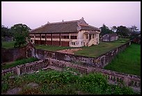 Building amongst gardens, Hue citadel. Hue, Vietnam (color)