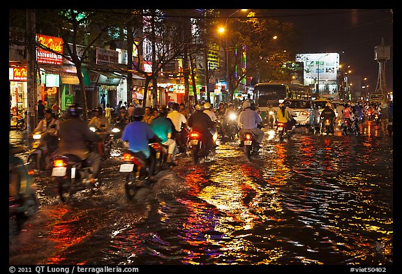 Flooded street and light reflections. Ho Chi Minh City, Vietnam
