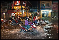 Street flooded by mooson rains at night. Ho Chi Minh City, Vietnam (color)
