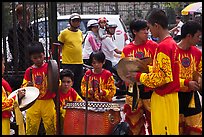Dragon dance band made of children, Thien Hau Pagoda. Cholon, District 5, Ho Chi Minh City, Vietnam (color)