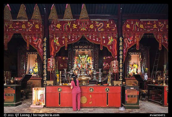 Woman at altar, Tam Son Hoi Quan Pagoda. Cholon, District 5, Ho Chi Minh City, Vietnam