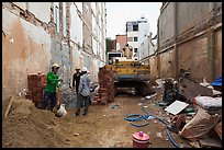 Buiding in construction in narrow space. Ho Chi Minh City, Vietnam (color)