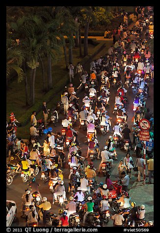 Heavy motorcycle traffic on Nguyen Hue boulevard at night. Ho Chi Minh City, Vietnam