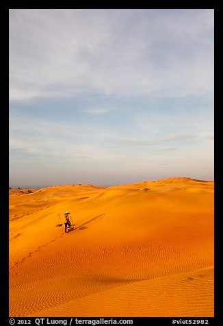 Sand dune landscape with figure. Mui Ne, Vietnam (color)