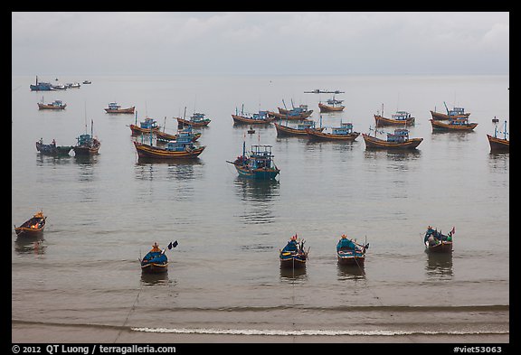 Fishing boats moored at the fishing beach. Mui Ne, Vietnam (color)