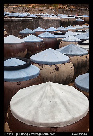 Fish sauch being aged in vats. Mui Ne, Vietnam