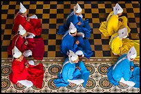 Cao Dai dignitaries wearing red (Confucian), blue (Taois) and yellow (Buddhist). Tay Ninh, Vietnam ( color)
