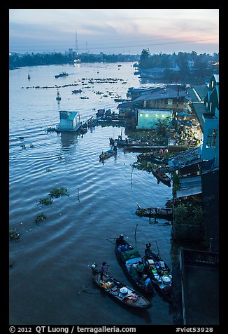 Boats and riverfront from above at dawn. Can Tho, Vietnam