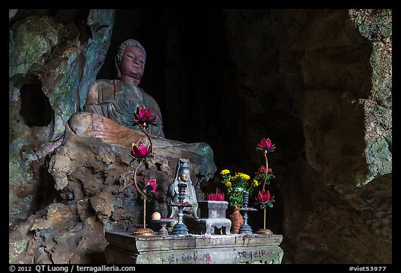 Altar and Buddha statue in cave. Da Nang, Vietnam (color)