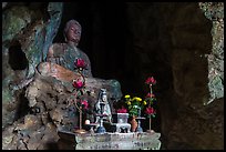 Altar and Buddha statue in cave. Da Nang, Vietnam (color)