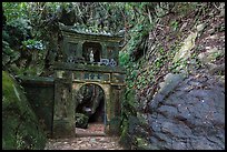 Gate in the jungle, Thuy Son hill, Marble Mountains. Da Nang, Vietnam ( color)