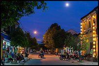 Street at dusk with moon and lanterns. Hoi An, Vietnam ( color)