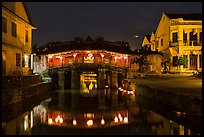 Covered Japanese Bridge reflected in canal by night. Hoi An, Vietnam ( color)