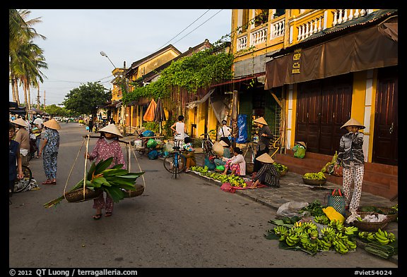 Fruit and vegetable vendors in old town. Hoi An, Vietnam (color)