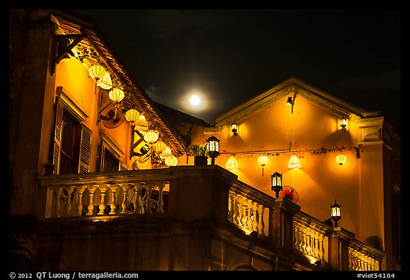 House with lanterns and moon. Hoi An, Vietnam