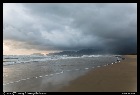 Stormy sunrise on beach. Vietnam