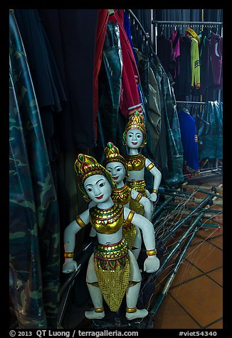 Water puppets controlled using long bamboo rods and string mechanism. Hanoi, Vietnam (color)