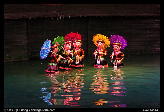 Water puppets (5 characters with umbrellas), Thang Long Theatre. Hanoi, Vietnam (color)