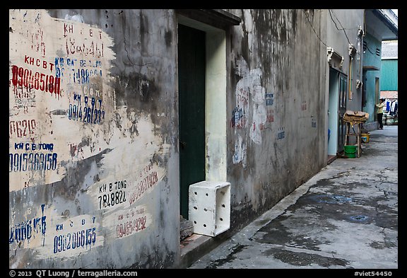 Alley with lots of painted numbers. Bat Trang, Vietnam (color)