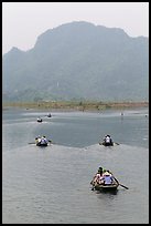 Rowboats on Sao Khe River, Trang An. Ninh Binh,  Vietnam (color)