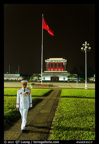 Officer walking in front of Ho Chi Minh Mausoleum. Hanoi, Vietnam (color)