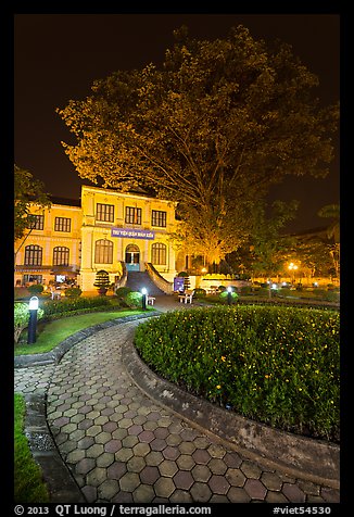Public garden and library building at night. Hanoi, Vietnam