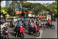 Motorbike riders waiting at intersection. Ho Chi Minh City, Vietnam ( color)