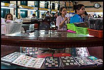 Stamp vending booth in central post office. Ho Chi Minh City, Vietnam