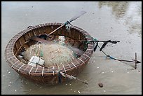 Round coracle boat with fishing gear. Mui Ne, Vietnam (color)