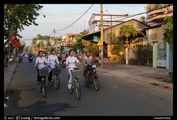 Schoolgirls on bicycles. Tra Vinh, Vietnam