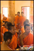Theravada monks in dining room, Hang Pagoda. Tra Vinh, Vietnam ( color)
