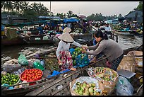 Fruit being sold from boat to boat, Phung Diem floating market. Can Tho, Vietnam ( color)