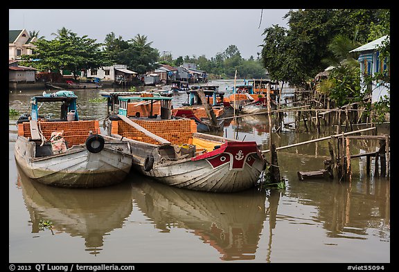 Boats loaded with bricks. Can Tho, Vietnam (color)