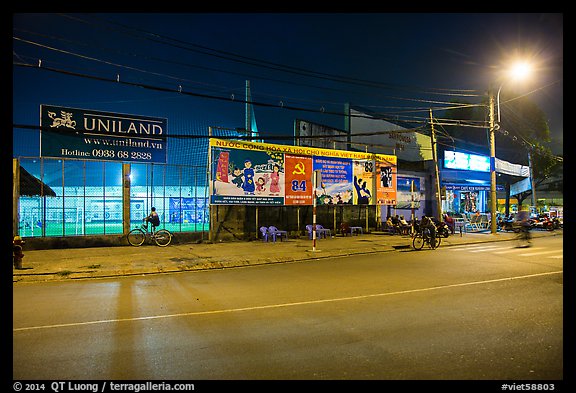 Street and stadium at night, District 8. Ho Chi Minh City, Vietnam
