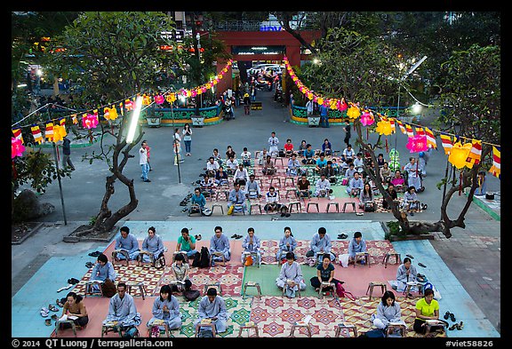 Worshippers from above, Viet Nam Quoc Tu pagoda, District 10. Ho Chi Minh City, Vietnam (color)