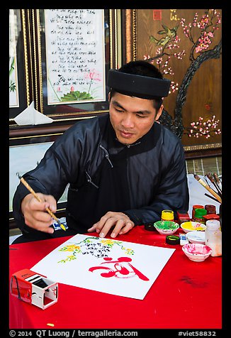 Caligrapher in traditional costume. Ho Chi Minh City, Vietnam (color)