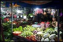 Vegetable seller at night, Con Dao Market, Con Son. Con Dao Islands, Vietnam ( color)