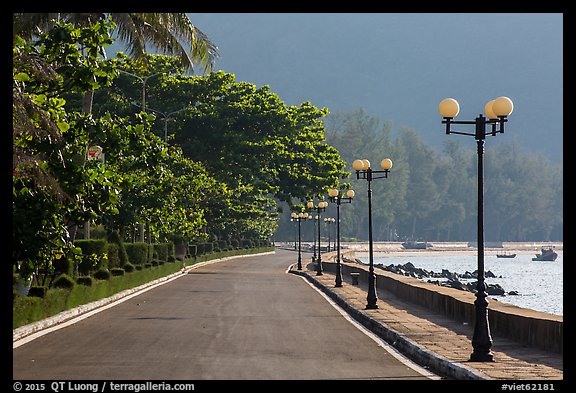 Deserted seafront promenade lined up with lamps, Con Son. Con Dao Islands, Vietnam (color)