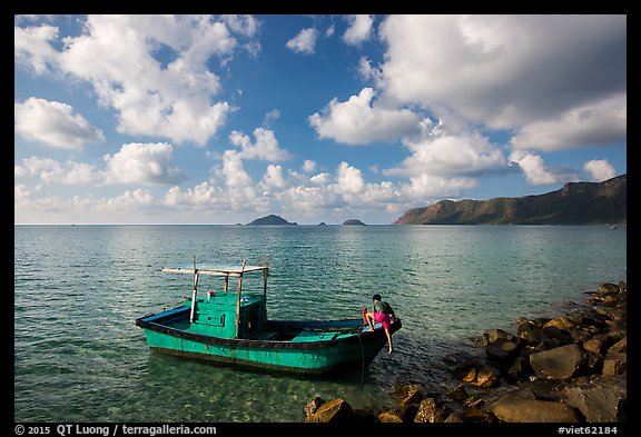 Fisherman climbing on boat, Con Son. Con Dao Islands, Vietnam (color)