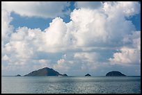 Tropical clouds above Bay Canh Island and other islets. Con Dao Islands, Vietnam ( color)