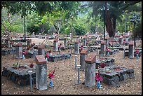 Graves memorializing independence fighters who died in jail. Con Dao Islands, Vietnam ( color)