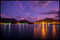Lights of Con Son reflected in harbor at dawn. Con Dao Islands, Vietnam ( color)