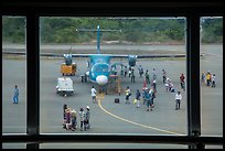 Airport tarmac with just deplaned passengers. Con Dao Islands, Vietnam ( color)