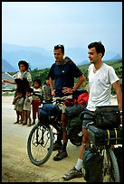 Western adventure travellers on mountain bikes, near Tam Duong. Northwest Vietnam