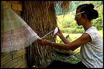 Woman sewing a net, between Lai Chau and Tam Duong. Northwest Vietnam (color)