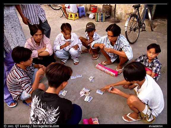 Children playing cards. Ho Chi Minh City, Vietnam (color)