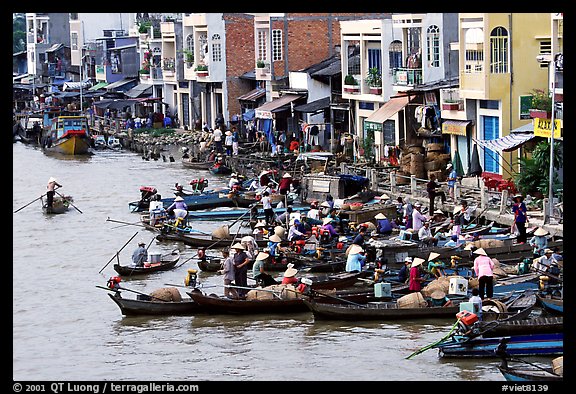 Busy waterfront at Phung Hiep. Can Tho, Vietnam (color)