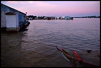 Floating houses. They double as fish reservoirs. Chau Doc, Vietnam (color)