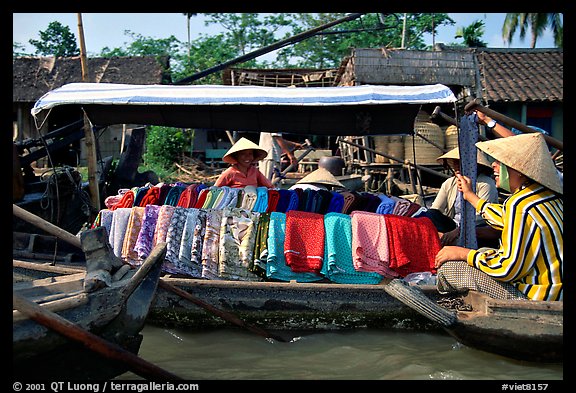 Garnments for sale on the Phong Dien floating market. Can Tho, Vietnam (color)